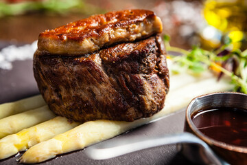 Tournedos Rossini. Foie gras, Black Angus beef tenderloin, white asparagus, red wine sauce....