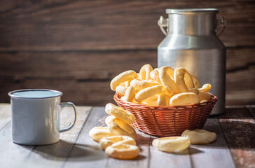 Biscuit, manioc flour cookies arranged on rustic wooden surface, selective focus.