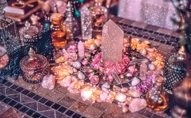 beautiful altar with crystals and rose flowers. magic light effect.