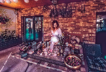 Fototapeta na wymiar beautiful altar with crystals and rose flowers. Magic light effect.