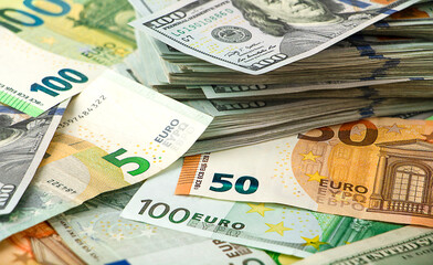 Obraz na płótnie Canvas Banknotes of dollar and euro close up. Money background