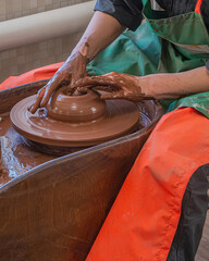 A series of images. An ancient pottery craft in a Russian village. A female artisan makes traditional peasant dishes from clay