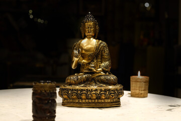Buddha meditating made of brass