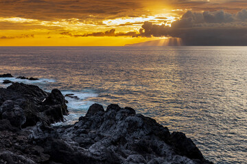 Sunset over the ocean and La Gomera island, one of Spain's Canary Islands