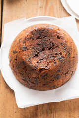 Christmas pudding with cranberries, raisins and prunes, whiskey