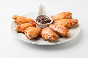 Barbecue wings on white background.