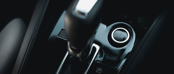 Close up Start Engine and Stop button. The power-on/off button inside a car.