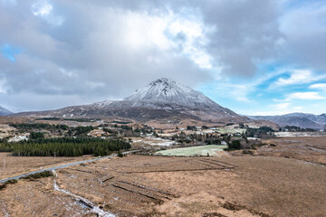 Aerial view of the snow covered Mount Errigal, the highest mountain in Donegal - Ireland.