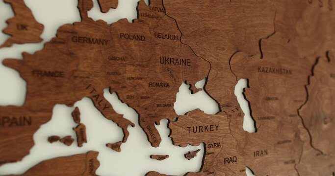 Close up of Elegant Wooden World Map Modern Room with White Wall. High quality 4k footage