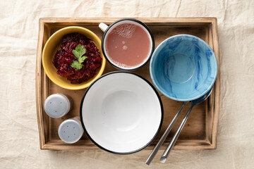 Set lunch in bowls in a wooden serving box. Food and catering concept. Open container for food