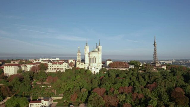 The drone aerial footage of The Basilica of Notre-Dame de Fourvière and Lyon city. The Basilica of Notre-Dame de Fourvière is a minor basilica in Lyon.