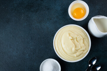 Glass jar with vanilla pudding. Custard cream. Traditional cream