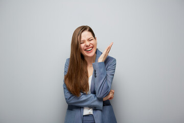 Excited business woman with closed eyes in business suit.