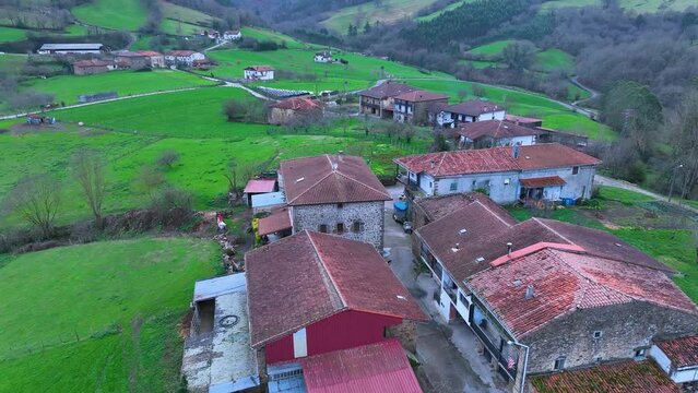 Winter landscape of the Church and the town of Pando. Aerial view from a drone. Arma&ntilde;on Natural Park. Valley of Carranza. Biscay. Basque Country. Spain. Europe