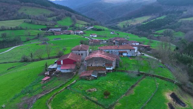 Winter landscape of the Church and the town of Pando. Aerial view from a drone. Arma&ntilde;on Natural Park. Valley of Carranza. Biscay. Basque Country. Spain. Europe