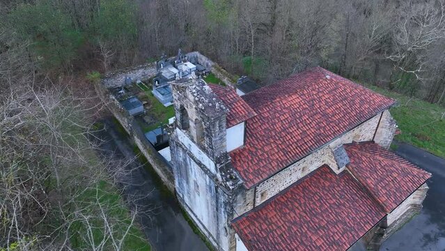 Winter landscape of the Church and the town of Pando. Aerial view from a drone. Arma&ntilde;on Natural Park. Valley of Carranza. Biscay. Basque Country. Spain. Europe
