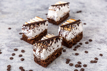 chocolate and meringue cake on marble background