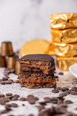 Chocolate alfajor with dulce de leche coffee capsules