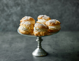 plate of cream puffs