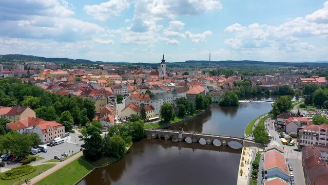 Medieval Town Pisek and historic stone bridge over river Otava in the Southern Bohemia, Czech Republic. Pisek Stone Bridge, the oldest preserved early Gothic bridge in the Czech republic.