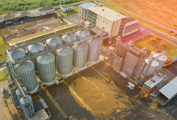 Grain storage. Silo at farm. Elevator for corn storage and grain. Feed Silos Hopper for wheat...