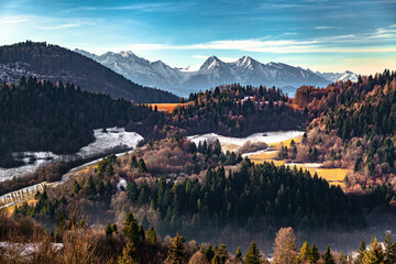 The awsome view of Tatra Mountains behind the colorful mixed forest, Poland