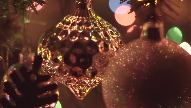 Christmas ornament close up on Christmas tree with lights