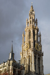 Fototapeta na wymiar Cathedral of Our Lady in Antwerp, Belgium (Onze-Lieve-Vrouwekathedraal) against dramatic sky