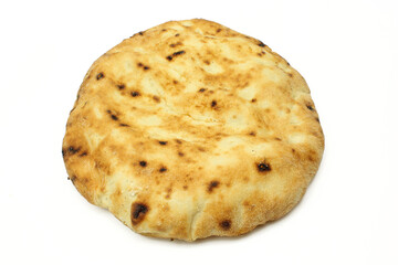 Single whole flatbread isolated on white background. Blakan cuisine soft rustic somun lepina