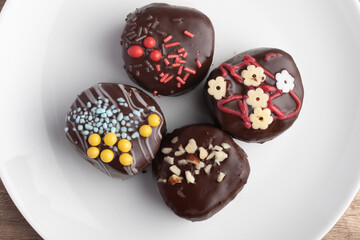 Chocolate ball snacks on a white plate