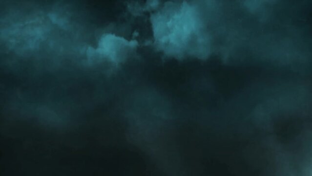 Blue Green Clouds with Lightning Streaks 4K Loop features rolling blue-green clouds in a dark sky with Lightning running through the clouds in a loop.
