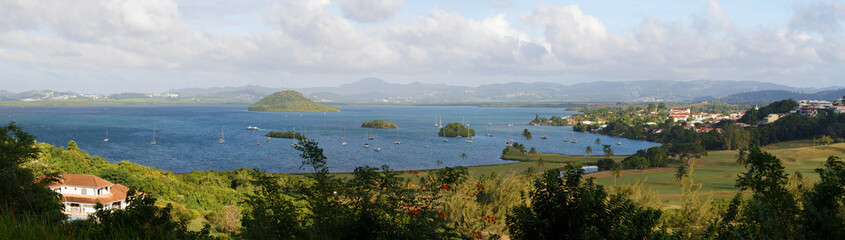 Fototapeta na wymiar The landscape view over the beautiful Tois Ilets bay, its gorgeous nature, hills, forest, Caribbean sea , French West Indies.