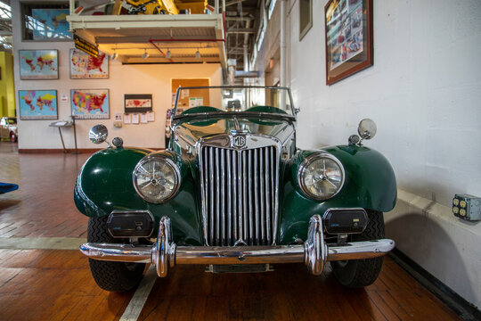 a green 1955 MG TF-1500 car at Lane Motor Museum with the largest collection of vintage European cars in Nashville Tennessee USA