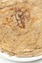 Whole wheat flour pancakes on the plate