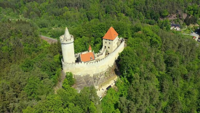Aerial view of medieval castle Kokorin nearby Prague in Czechia. Central Europe. Medieval gothic castle Kokorin, Kokorinsko protected landscape area in Czech Republic. Medieval gothic castle Kokorin.