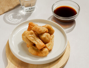 Pempek a traditional food from Palembang Indonesia, served with sour sauce