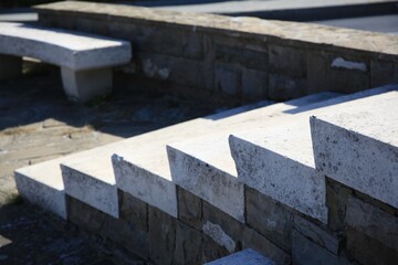 View of empty old concrete staircase outdoors on sunny day