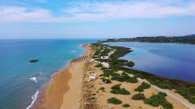 Aerial drone view of Halikounas Beach and Lake Korission, Corfu island, Ionian Sea, Greece. Halikounas Beach, Corfu Island. View of the deserted, sandy, windy beach on the western part of Corfu.