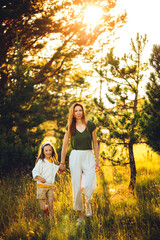 Mother and daughter walking