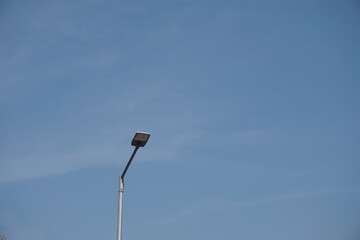 street lamp on blue sky