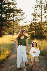Mother and daughter walking