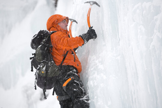 A man ice climbing on Tuckerman's Ravine on Mt. Washington in the White Mountains of New Hampshire