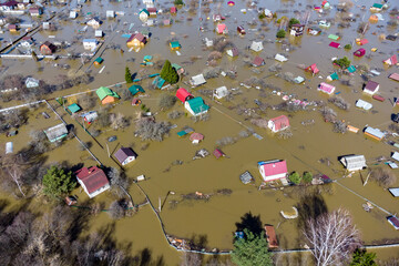 Aerial view of the flooded suburban areas during the spring flood. Houses in the water during the flood