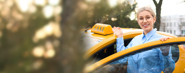 Portrait of beautiful taxi driver near car. Banner for design - obrazy, fototapety, plakaty