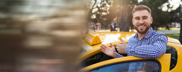 Portrait of handsome taxi driver outdoors. Banner for design