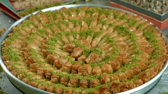 Traditional turkish baklava pistachio pastry. Dilberdudagi, ozel kesim baklava, cikolatali baklava, fistikli baklava, katmer, fistikli kadayif, kattafi, fistik sarma, soguk baklava, midye baklava, cev