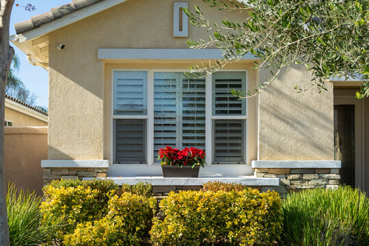 Suburban single family home exterior window close-up in a sunny day, Menifee, California, USA