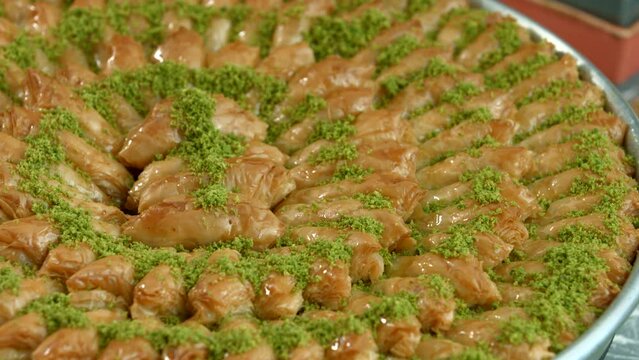 Traditional turkish baklava pistachio pastry. Dilberdudagi, ozel kesim baklava, cikolatali baklava, fistikli baklava, katmer, fistikli kadayif, kattafi, fistik sarma, soguk baklava, midye baklava, cev