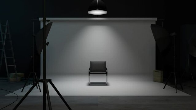 turning lights on at empty recording studio with chair in center. Camera zoom.