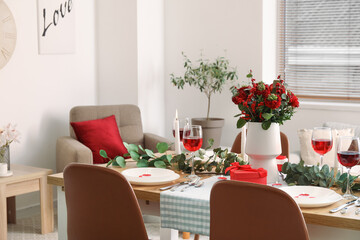 Table setting for Valentine's Day with beautiful flowers in dining room